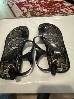Black Snake-Print Jelly Sandals with Buckle by Michael Korrs